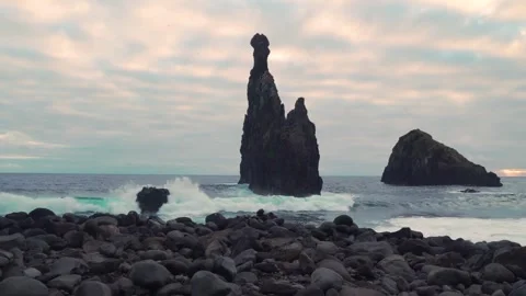 Ocean waves crashing on ribeira da janela rocky beach Stock Footage 293159077