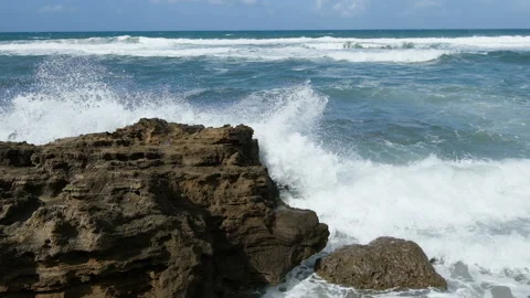 Ocean waves crashing on rocks after sea storm,nature power effects,environment Video stock 207801445
