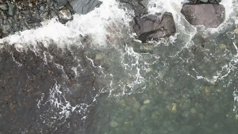 Ocean Waves Crashing On The Rocks In The Beach Shore. - high angle shot Stock Footage 292652721