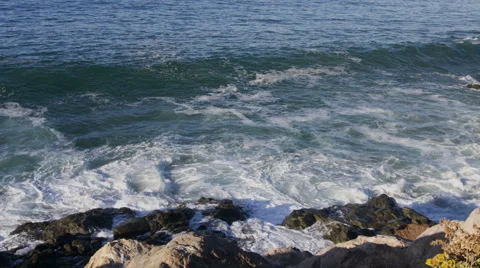 Ocean waves crashing on rocks Stock Footage 44234190