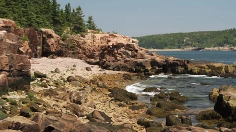Ocean waves crashing into rocks Stock Footage 48340990
