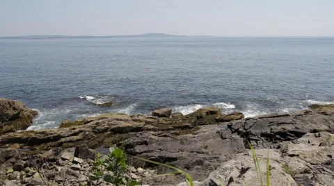 Ocean waves crashing into rocks 스톡 동영상 48341638