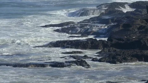 Ocean waves crashing on the rocks Stock Footage 76145578