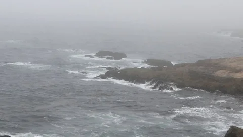 Ocean waves crashing on rocks Stock Footage 97200099