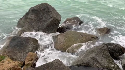 Ocean waves crashing on rocks Stock Footage 169327393