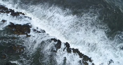 Ocean Waves Crashing on Rocks Stock Footage 318443559