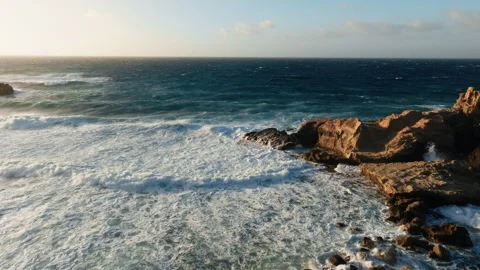Ocean waves crashing on rocks Stock Footage 336538089