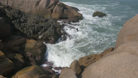 Ocean waves crashing on the rocks in good weather, in Brazil Stock Footage 231540304