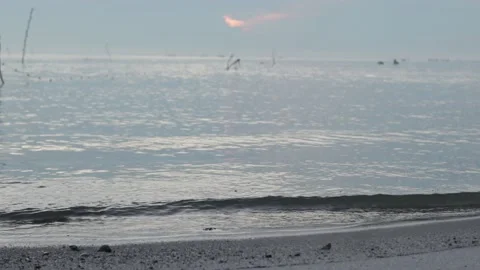 Ocean waves crashing on sand beach Stock Footage 181097799
