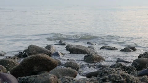 Ocean waves crashing on sand beach Stock Footage 181100602