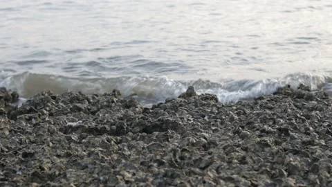 Ocean waves crashing on sand beach Stock Footage 181157226