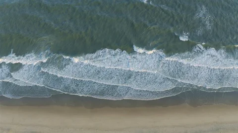 Ocean Waves Crashing on Sandy Beach Shoreline Aerial View Stock Footage 109391175