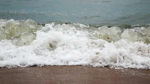 Ocean Waves Crashing on Sandy Beach Shore Stock Footage 311587158