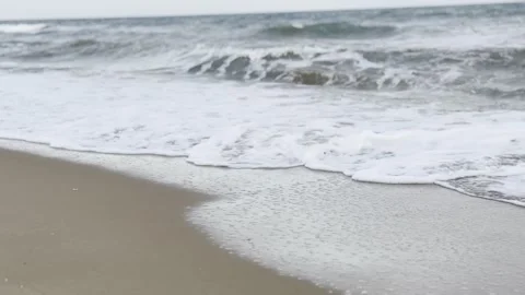 Ocean Waves Crashing on Sandy Beach - Hua Hin Thailand  4K HDR Moody Seascape Stock Footage 335648750