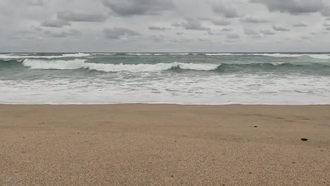 Ocean Waves Crashing on Sandy Beach (Horizontally Leveled) Stock Footage 338172143