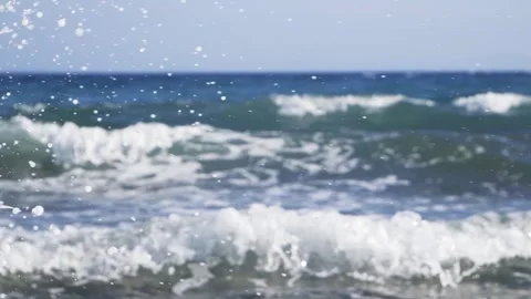 Ocean waves crashing on shore spraying sea water into air Stock Footage 337409573
