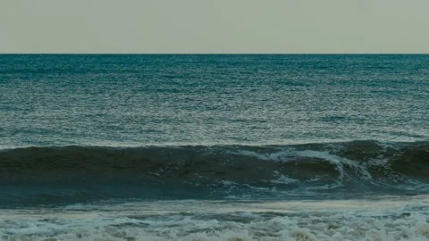 Ocean waves crashing on the shore at twilight. Stock Footage 330719613
