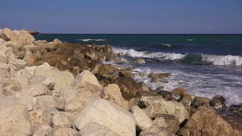 Ocean waves crashing on the stone shore Stock Footage 101838012