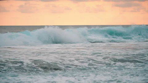 Ocean Waves Crashing at Sunset Stock Footage 303394266
