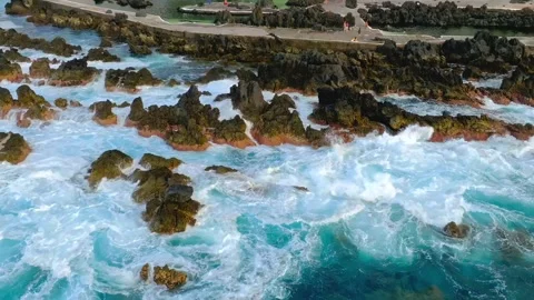 Ocean Waves Crashing on Volcanic Rocks and Natural Pools Stock Footage 341645353