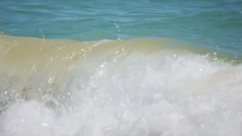 Ocean waves cresting and breaking on the shore in 4k slow motion 120fps Stock Footage 267566067