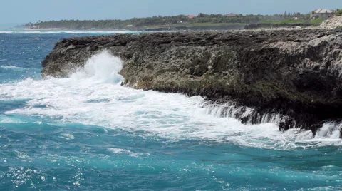 Ocean waves crushing coastline Stock Footage 56731923