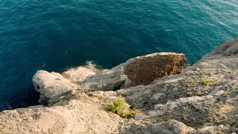 Ocean waves crushing on wild beach at sunset. Coastline. Stock Footage 163048100