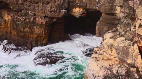 Ocean waves is drilling the cave. Boca do Inferno, Cascais, Portugal. Stock Footage 132858926