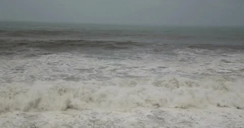 Ocean Waves During a Storm stormy weather sea wave hitting beach coral 動画素材 334647438