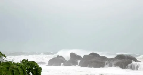 Ocean Waves During a Storm stormy weather sea wave hitting beach coral 動画素材 334647557