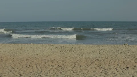 Ocean waves on an empty beach 스톡 동영상 116747494