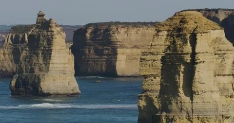 Ocean Waves Exploding on Ancient Stacks Formations 動画素材 330343320