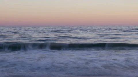 Ocean waves flow toward the camera. 4K. (2 of 3 ) Stock Footage 229786849