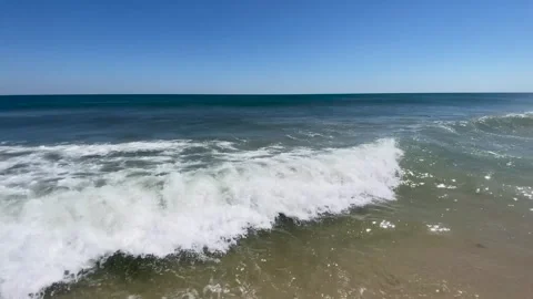 Ocean waves forming a funnel on the coast of Long Island New York Stock Footage 277554909