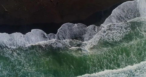Ocean Waves Forming Textured Patterns Along Sandy Shore Stock-Footage 332146503