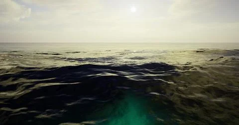 Ocean waves gently rolling under a bright sun in a clear sky Illustrazione stock