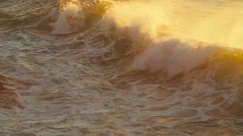 Ocean Waves at high tide roll in and crash against the coastal cliffs, huge.. Stock Footage 329694988