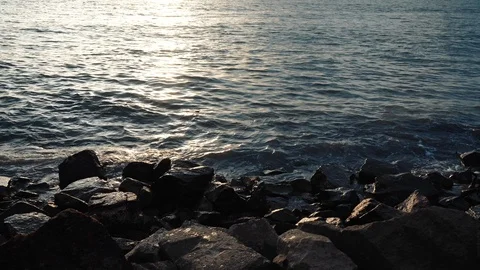 Ocean waves hit the rocky shore in slow motion. Stock Footage 101062585