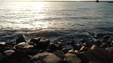 Ocean waves hit the rocky shore in slow motion. Stock Footage 101062600