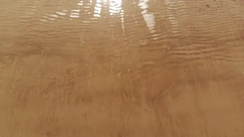 Ocean Waves Hit Sand on Beach, Bird's Eye Shot Stock Footage 146155905