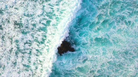 Ocean waves hitting a coral reef, view from above. Stock Footage 134620768