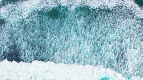Ocean waves hitting a coral reef, view from above. Stock Footage 134682523