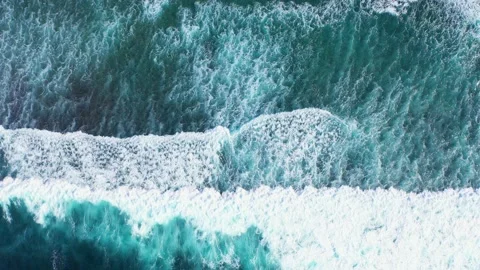 Ocean waves hitting a coral reef, view from above. Stock Footage 134682538