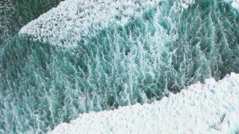Ocean waves hitting a coral reef, view from above. Stock Footage 134682730