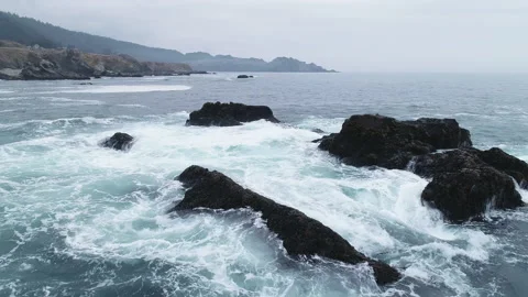 Ocean waves hitting rocks drone shot - Sonoma Coast, California 4K Stock Footage 146185669