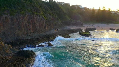 Ocean Waves Hitting Rocky Coast And Cathedral Rocks Sea Stack In Kiama Video stock 156228581