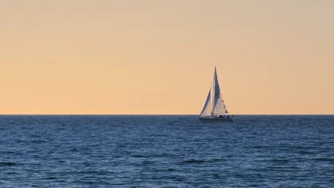 Ocean waves with horizon and blue sky. Baltic sea with sailing boat. Stock Footage 155331047