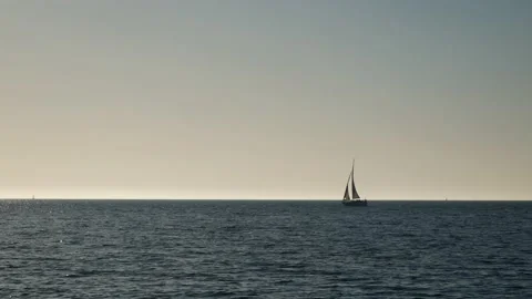 Ocean waves with horizon and blue sky. Baltic sea with sailing boat. Stock Footage 155331821