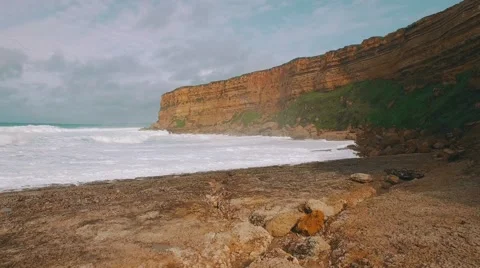 Ocean Waves Incoming on Stone Beach Stock Footage 59318699