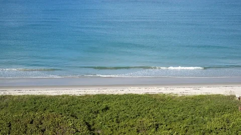 The ocean waves lapping on the beach. Stock Footage 121636086